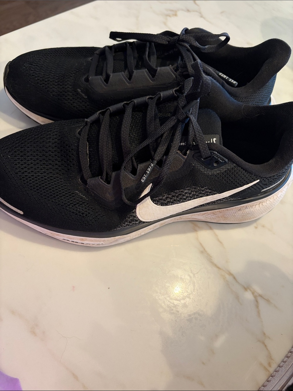 Nike Women’s Black Running Shoes with White Swoosh Accent
